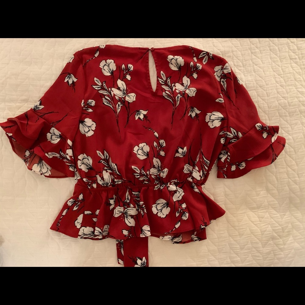 Red Floral Peplum Top! Front Bowtie detail.